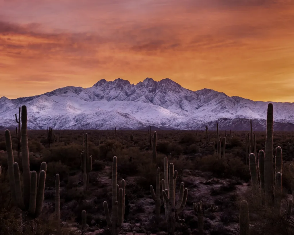 Snow covered Four Peaks during sunrise in Arizona